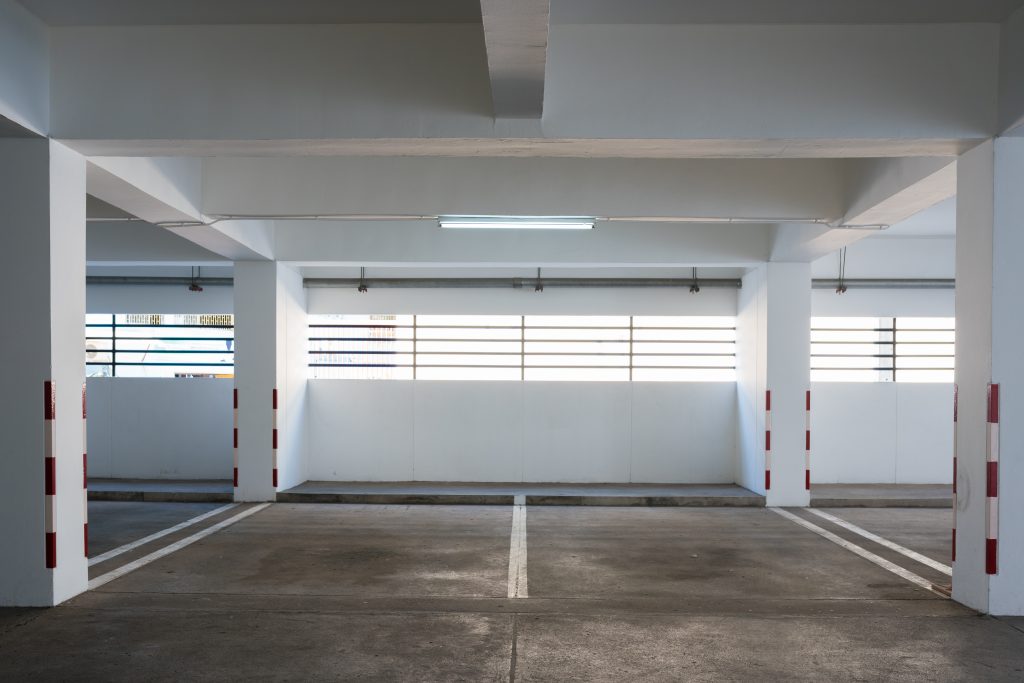 What is the minimum distance between garage door and ceiling